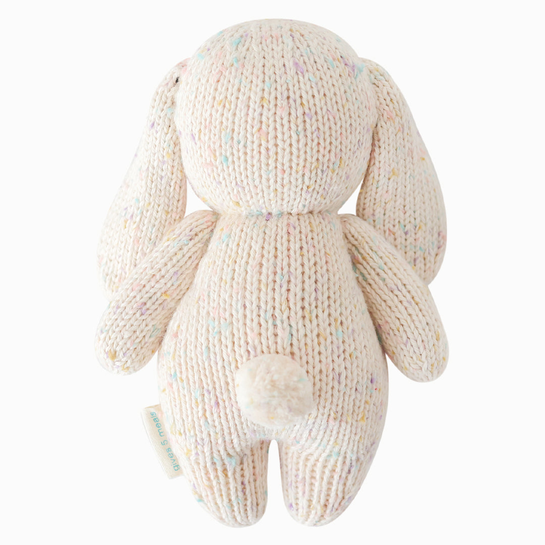 The bunny doll shown from the back. Baby bunny in confetti has a fluffy, cotton tail.