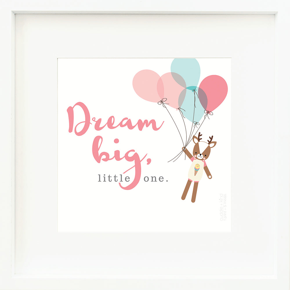 An inspirational print with a graphic of Willow the deer on a white background holding onto a bundle of pink and blue balloons, with the words “Dream big, little one” in pink and gray.