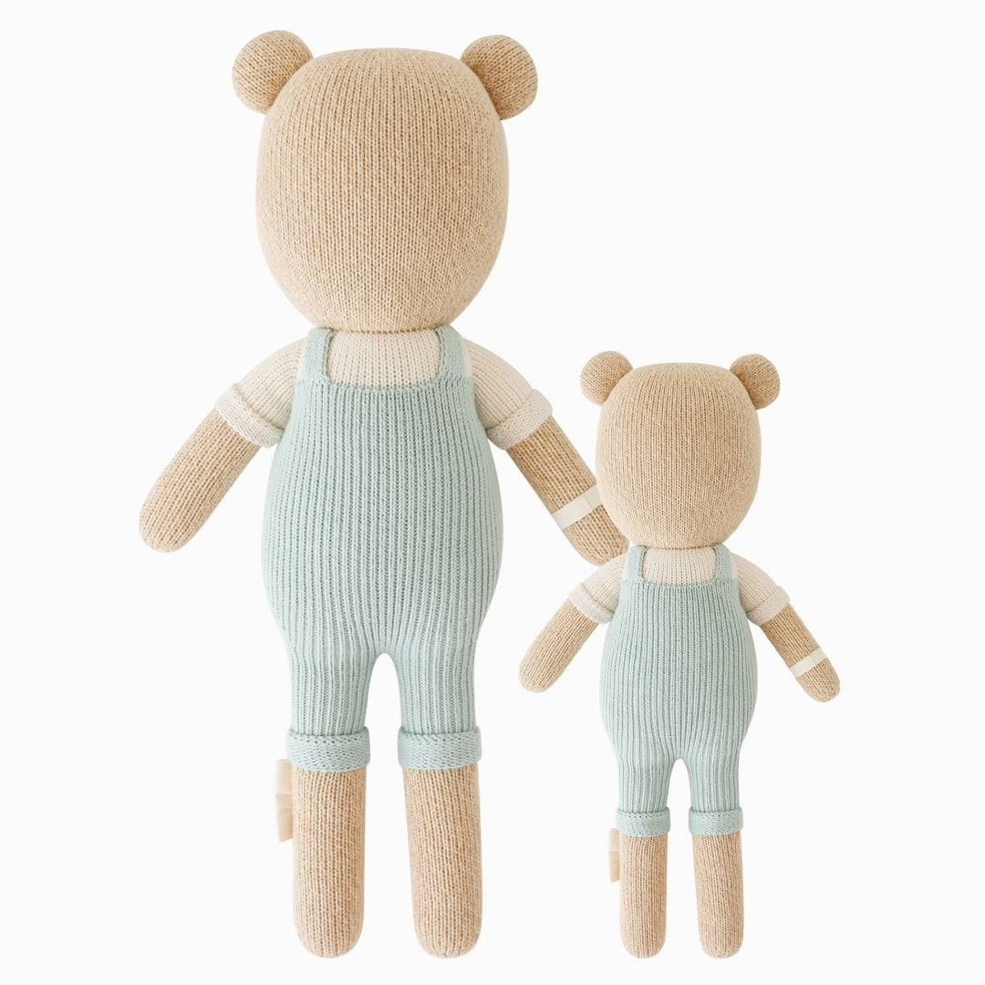 Cuddle and kind stuffed doll Charlie the honey bear in the regular and little sizes, shown from the back.