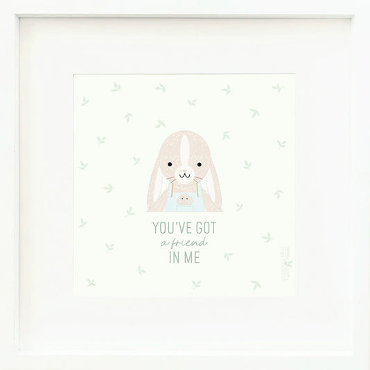 An inspirational print with a graphic of Briar the bunny on a white background with a green leaf print and the words “You’ve got a friend in me” in green text.