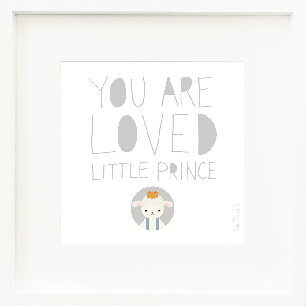 An inspirational print with a graphic of Sebastian the lamb on a white background with the words “You are loved little prince” in gray.