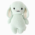 A cuddle and kind doll from the baby animal collection, baby bunny in mint, shown from the front. Baby bunny in mint has fresh, mint fur.