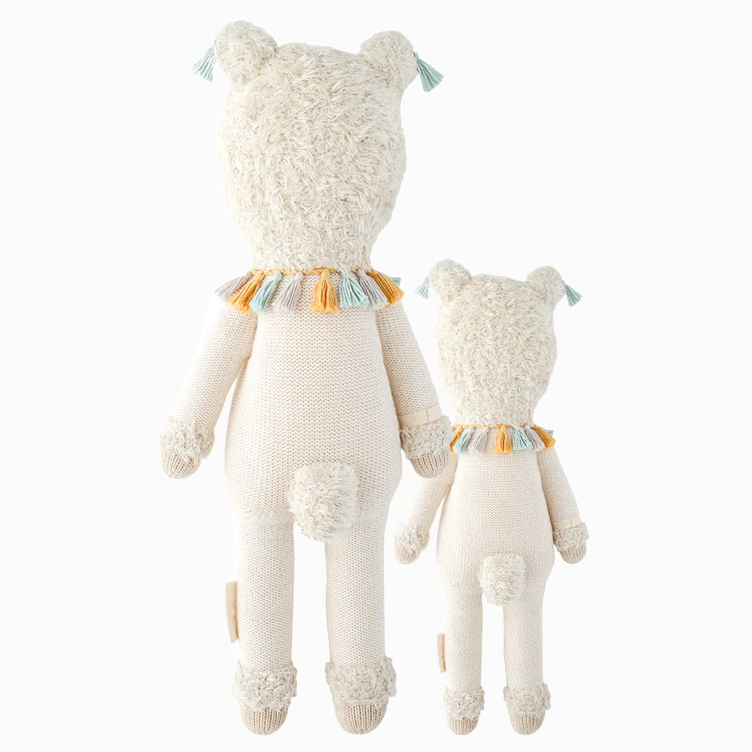 Cuddle and kind doll Lucas the llama in the regular and little sizes, shown from the back. Lucas has a fluffy tail.