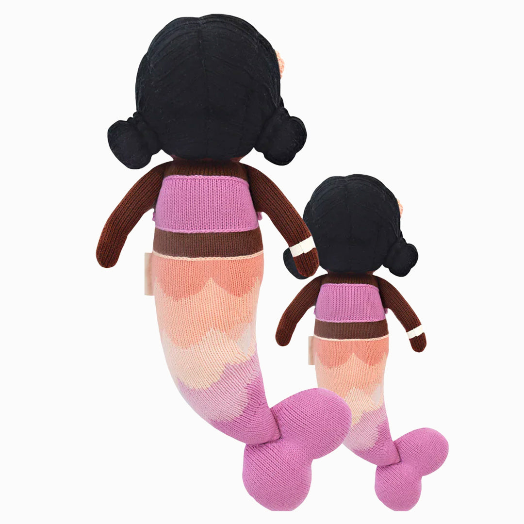 Cuddle and kind doll Maya the mermaid in the regular and little sizes, shown from the back.