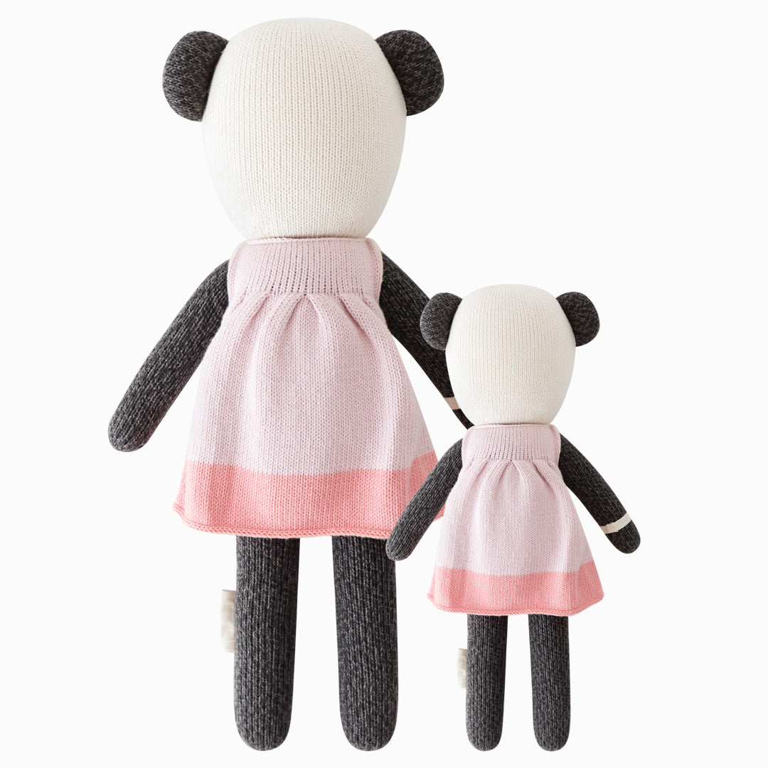 Cuddle and kind stuffed doll Polly the panda in the regular and little sizes, shown from the back.