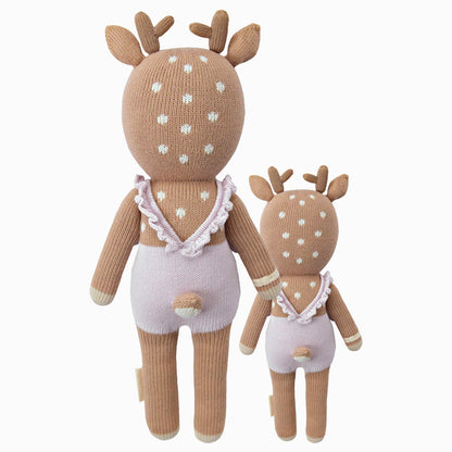 Cuddle and kind doll Violet the fawn in the regular and little sizes, shown from the back. Violet’s tail is poking out the back of her romper.