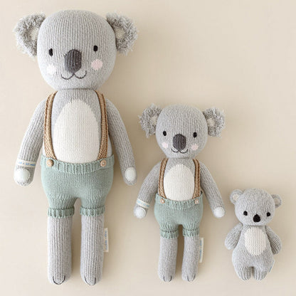 Three hand-knit dolls from cuddle and kind: Quinn the koala in the regular and little sizes, and baby koala.