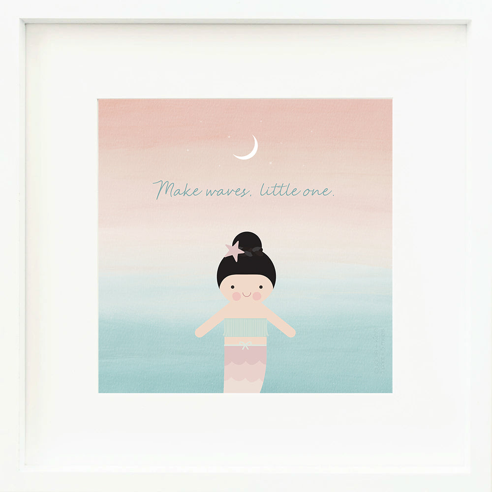 An inspirational print with a graphic of Luna the mermaid and the words “Make waves, little one” in blue. The background has a blue and pink gradient pattern and a moon icon.