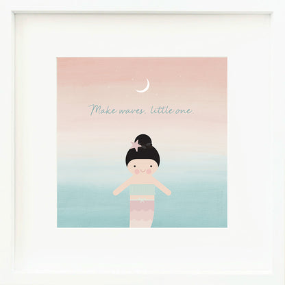 A framed print with a drawing of Luna the mermaid and text that says “Make waves, little one.”