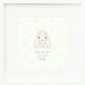 An inspirational print with a graphic of Briar the bunny on a white background with a green leaf print and the words “You’ve got a friend in me” in green text.