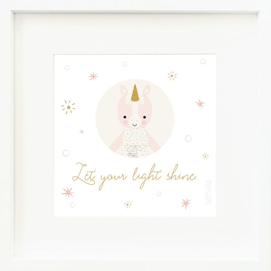 An inspirational print with a graphic of Ella the unicorn on a white background with star accents and the words “Let your light shine” in golden yellow.