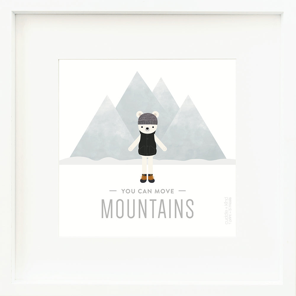 A framed print with a drawing of Hudson the polar bear and text that says “You can move mountains.”