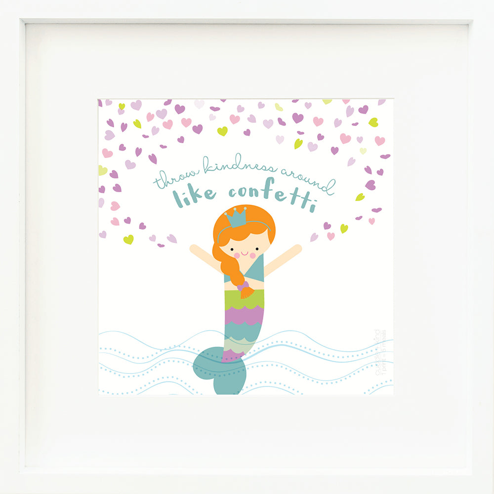 A framed print with a drawing of Isla the mermaid and text that says “Throw kindness around like confetti.”