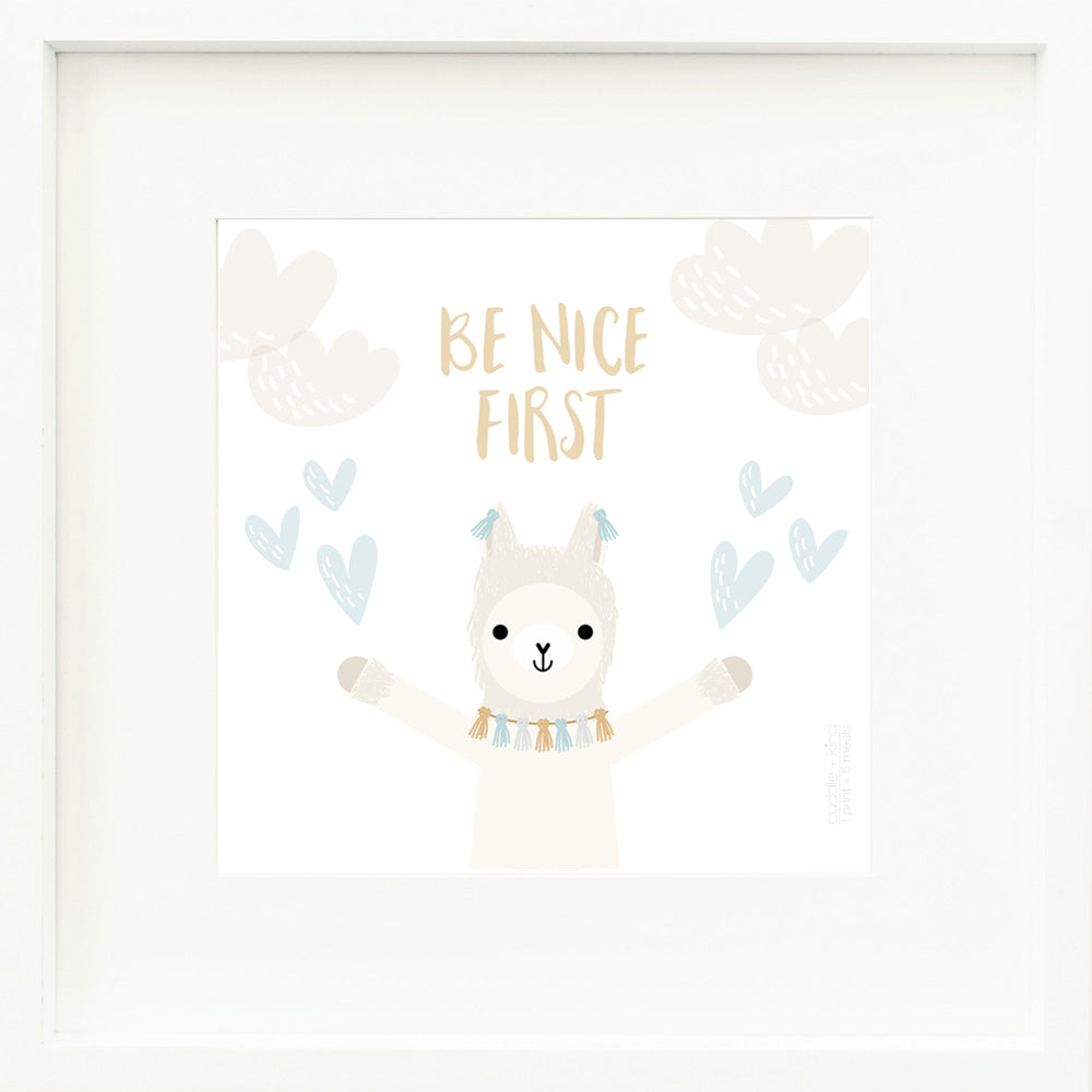 An inspirational print with a graphic of Lucas the llama with his arms in the air, on a white background with heart drawings and the words “Be nice first” in yellow.