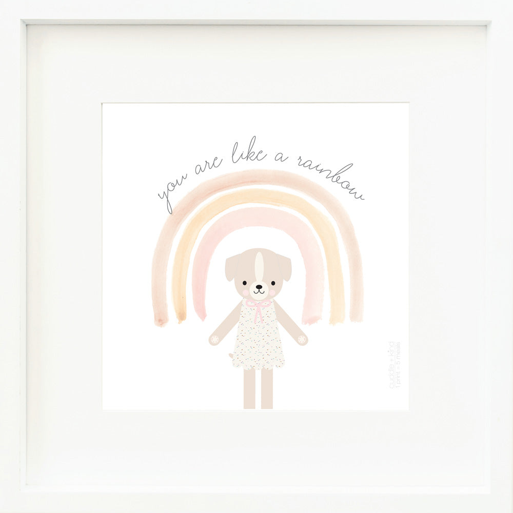 A framed print with a drawing of Mia the dog and text that says “You are like a rainbow.”