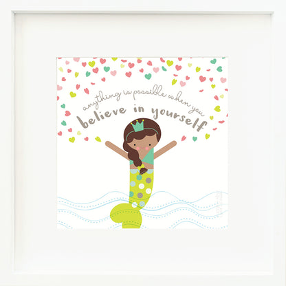 A framed print with a drawing of Pearl the mermaid and text that says “Anything is possible when you believe in yourself.”