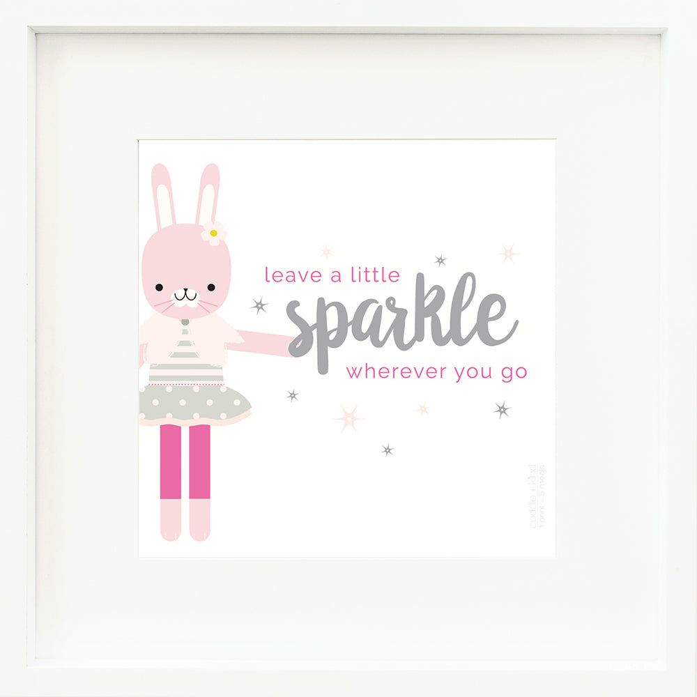 An inspirational print with a graphic of Chloe the bunny on a white background with star accents and the words “Leave a little sparkle wherever you go” in pink and gray.