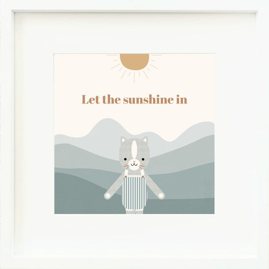 An inspirational print with a graphic of Dylan the kitten, blue ripples and a sun and the words “Let the sunshine in” in dark yellow.