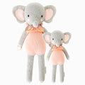 Eloise the elephant in the regular and little sizes, shown from the front. Eloise is wearing a pink romper with a ruffle.
