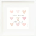 An inspirational print with a graphic of Lucy the lamb on a white background with hearts and the words “Sweet dreams little lamb” in dark gray.