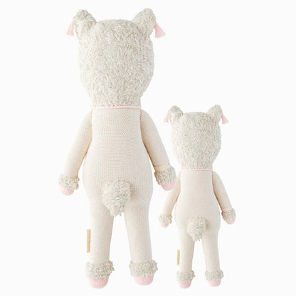 Cuddle and kind doll Lola the llama in the regular and little sizes, shown from the back. Lola has a fluffy tail.