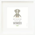 An inspirational print with a graphic of Noah the dog on a white background with the words “Don’t ever lose your sense of wonder” in gray.