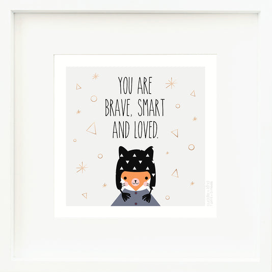 An inspirational print with a graphic of Sadie the fox on a gray background with gold star, circle and triangle accents and the words “You are brave, smart and loved” in black.