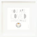 An inspirational print with a graphic of Sebastian the lamb on a white background with the words “You are loved little prince” in gray.